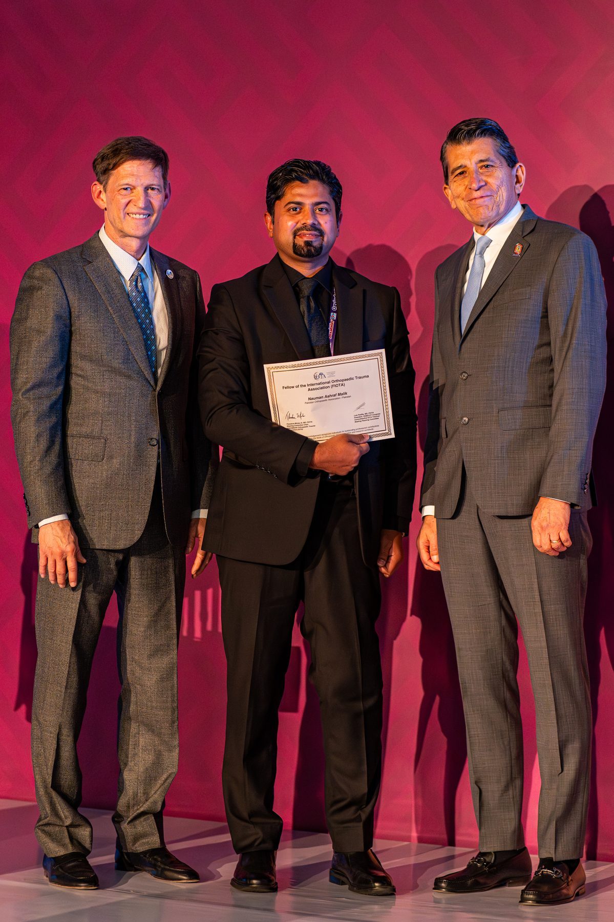 Dr. Nauman Ashraf Malik receiving FIOTA Fellowship Award